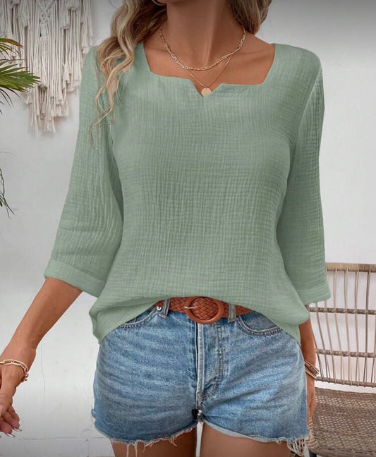 Blusa escote elegante